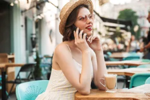 Young-woman-in-dress-and-straw-hat