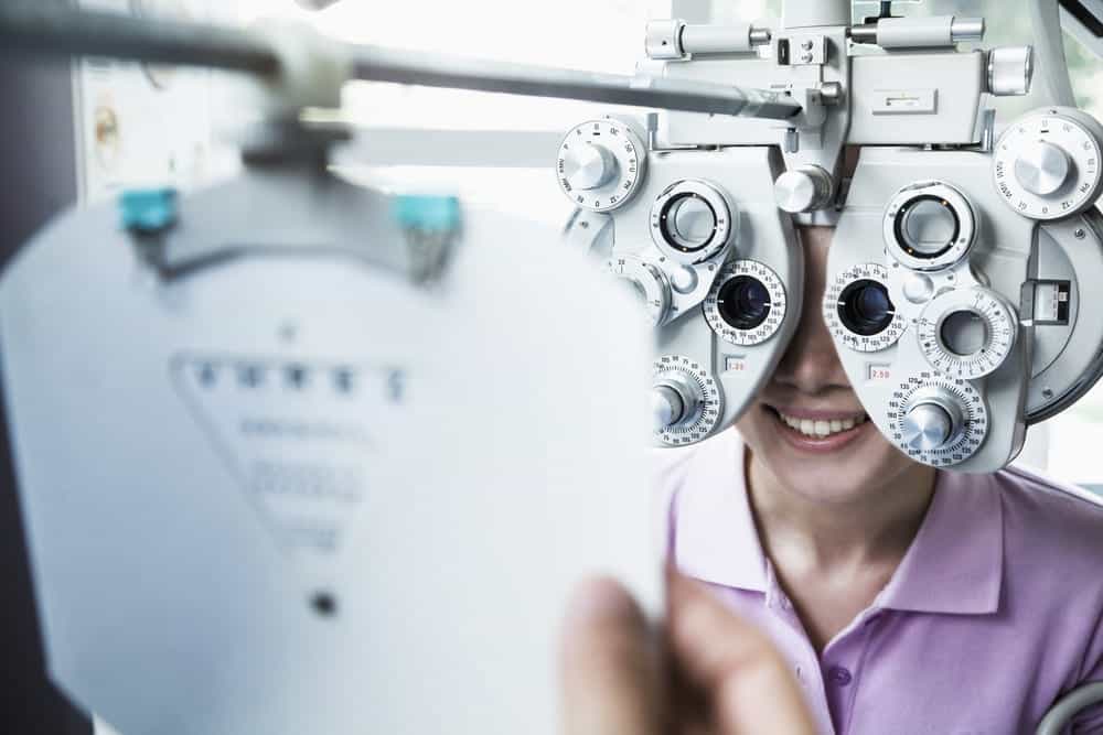 Young Woman Undergoing Eye Exam