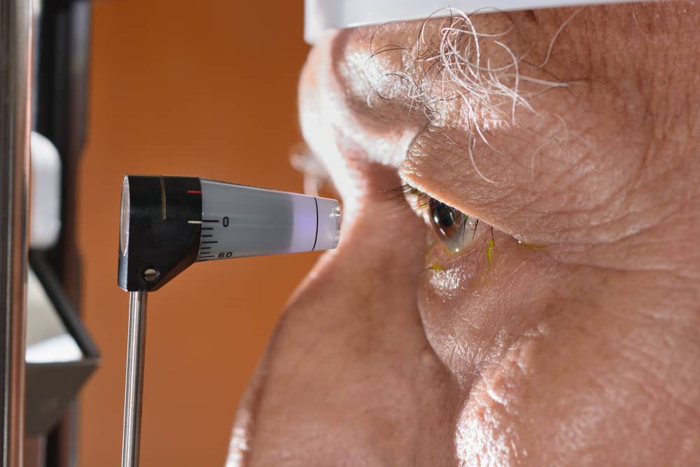 Close-up of senior man receiving eye pressure test