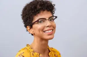 Smiling young woman wearing glasses