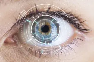 Close-up of eye with circular digital graphic overlaid